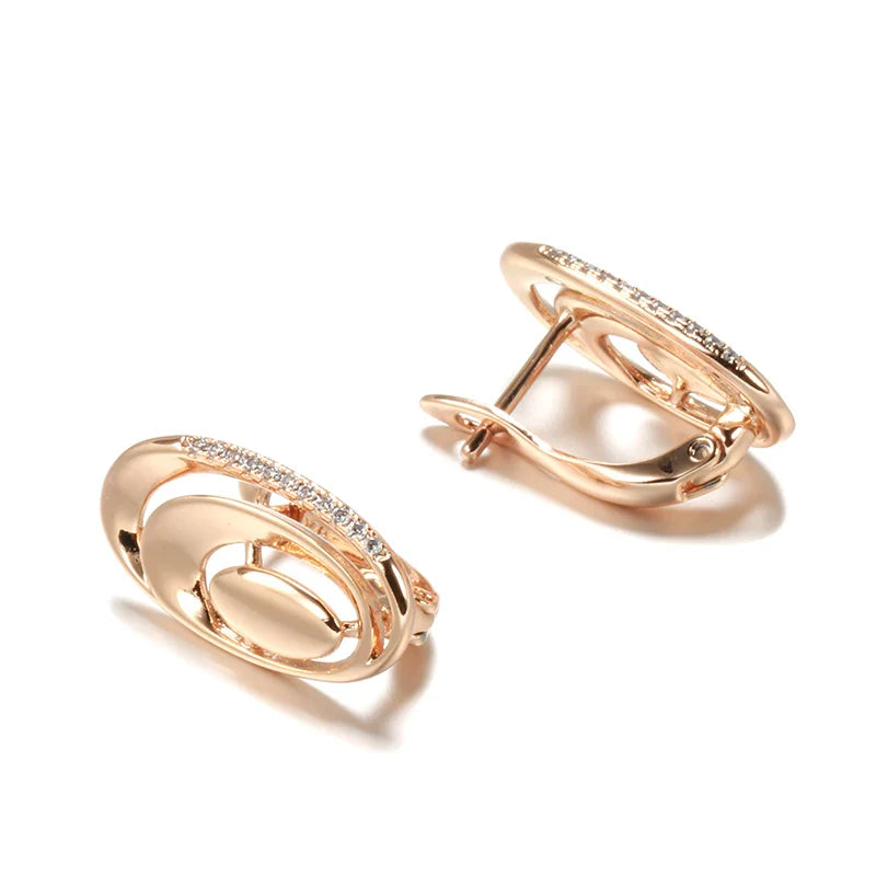 Boucles d’oreilles pendantes géométriques en or rose sophistiquées