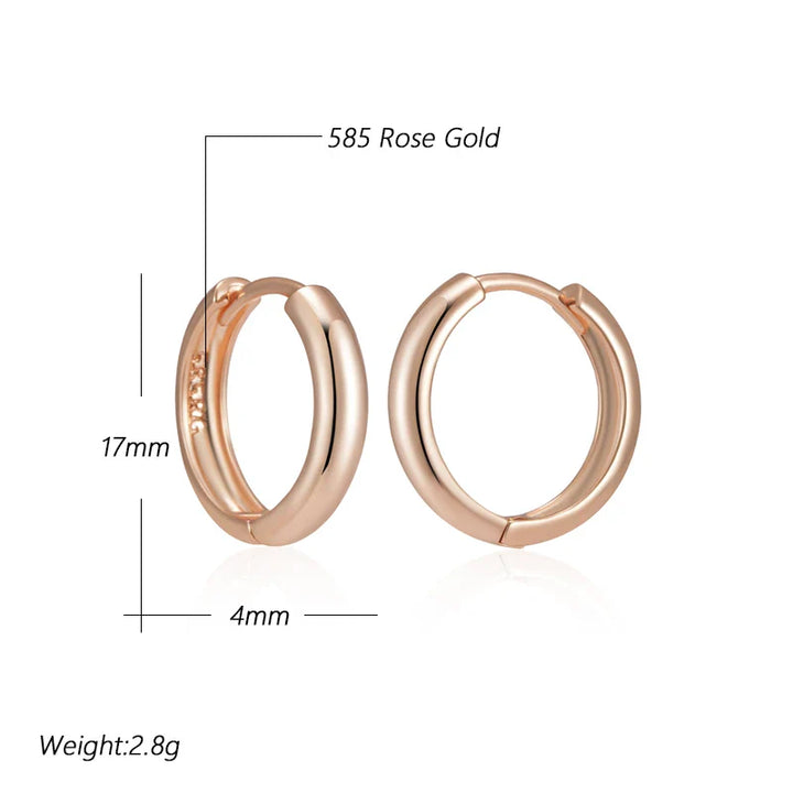 Boucles d’oreilles pendantes élégantes en or rose brillant