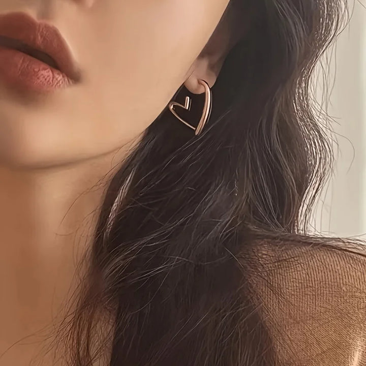 Boucles d’oreilles élégantes en or rose en forme de cœur