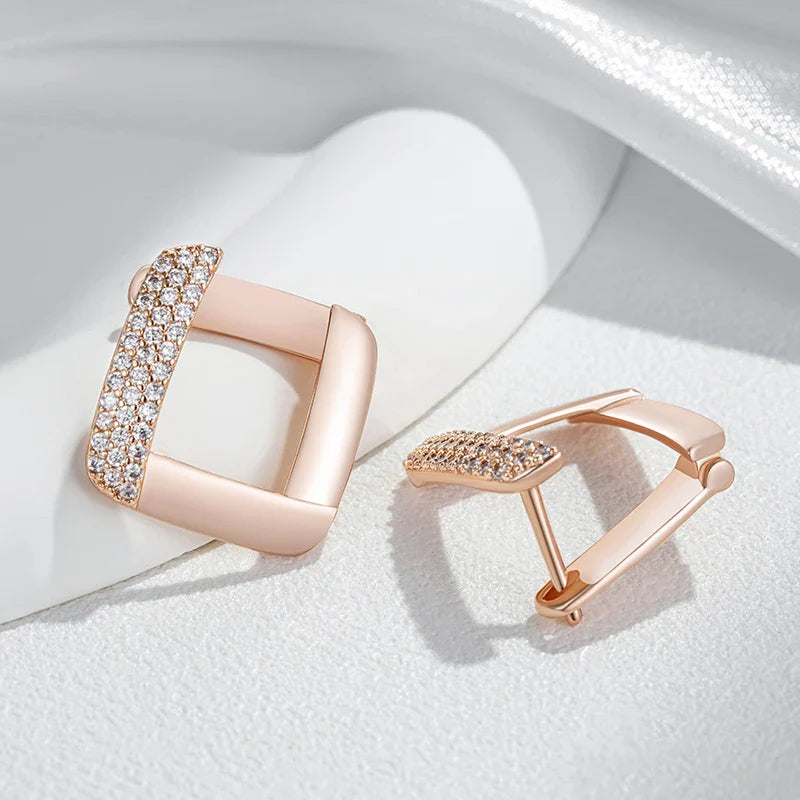 Puces d’oreilles en or rose et zircon