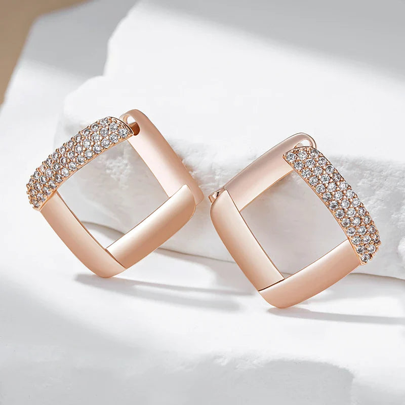 Puces d’oreilles en or rose et zircon