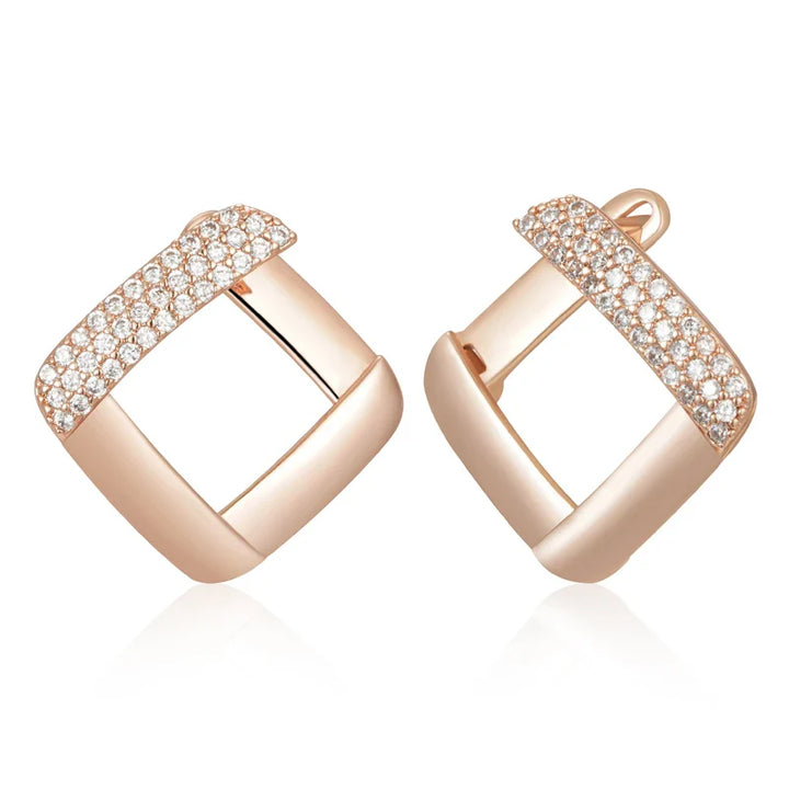 Puces d’oreilles en or rose et zircon