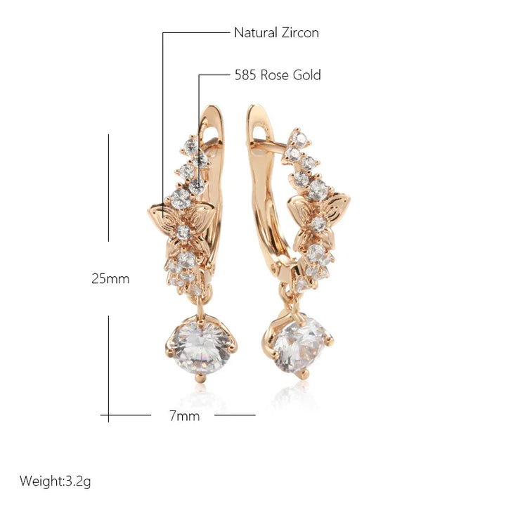 Boucles d’oreilles pendantes papillon chic en or rose